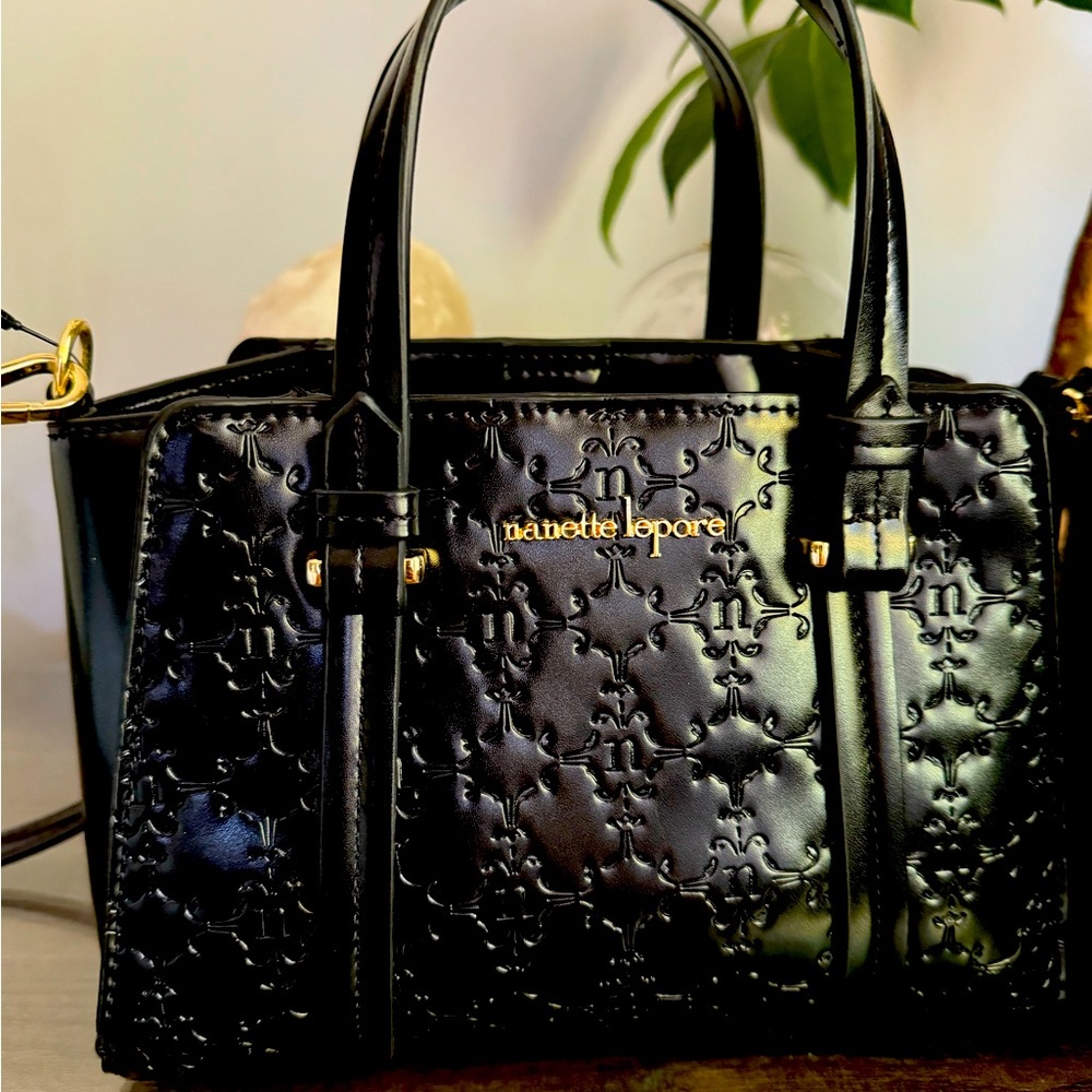 Nanette Lepore bag, Like New, 2-in-1 design,gold tone hardware,adjustable strap.